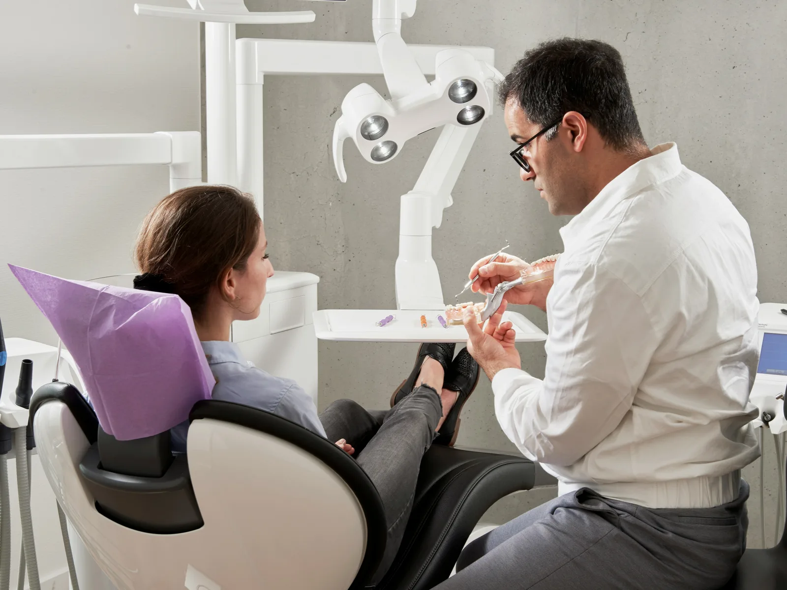 Implant consultation with a patient, at the implant practice in Victoria