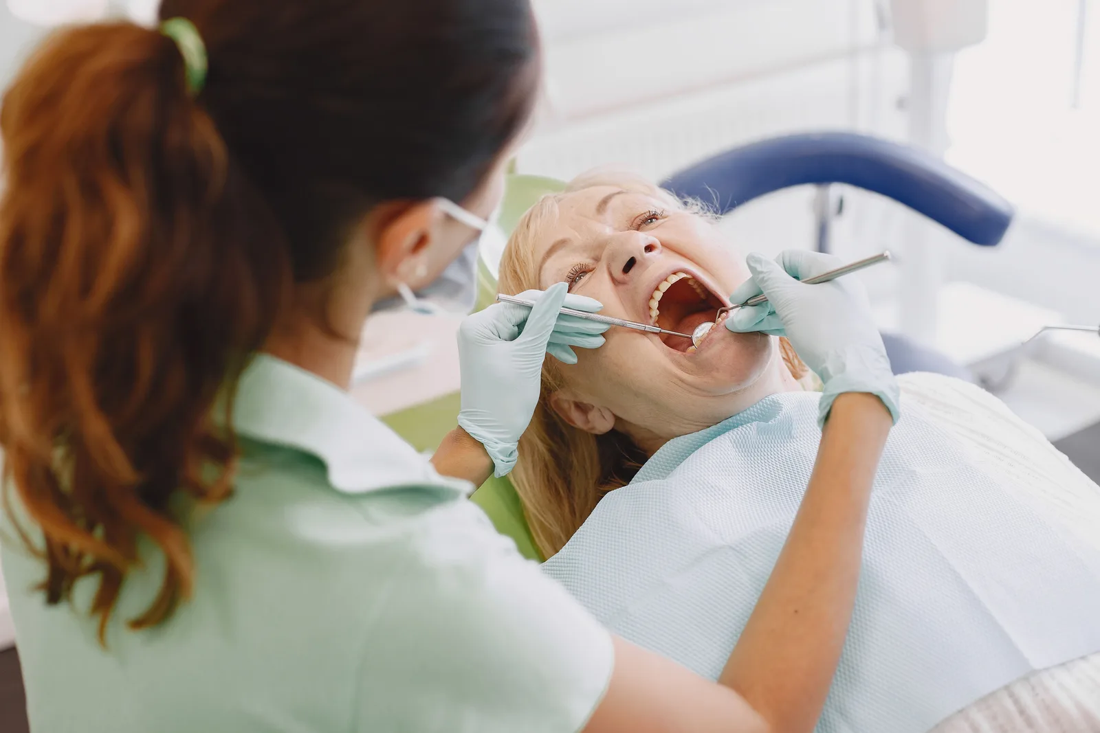 Oral exam before implant planning, alongside the Implant Consultation explanation in Victoria