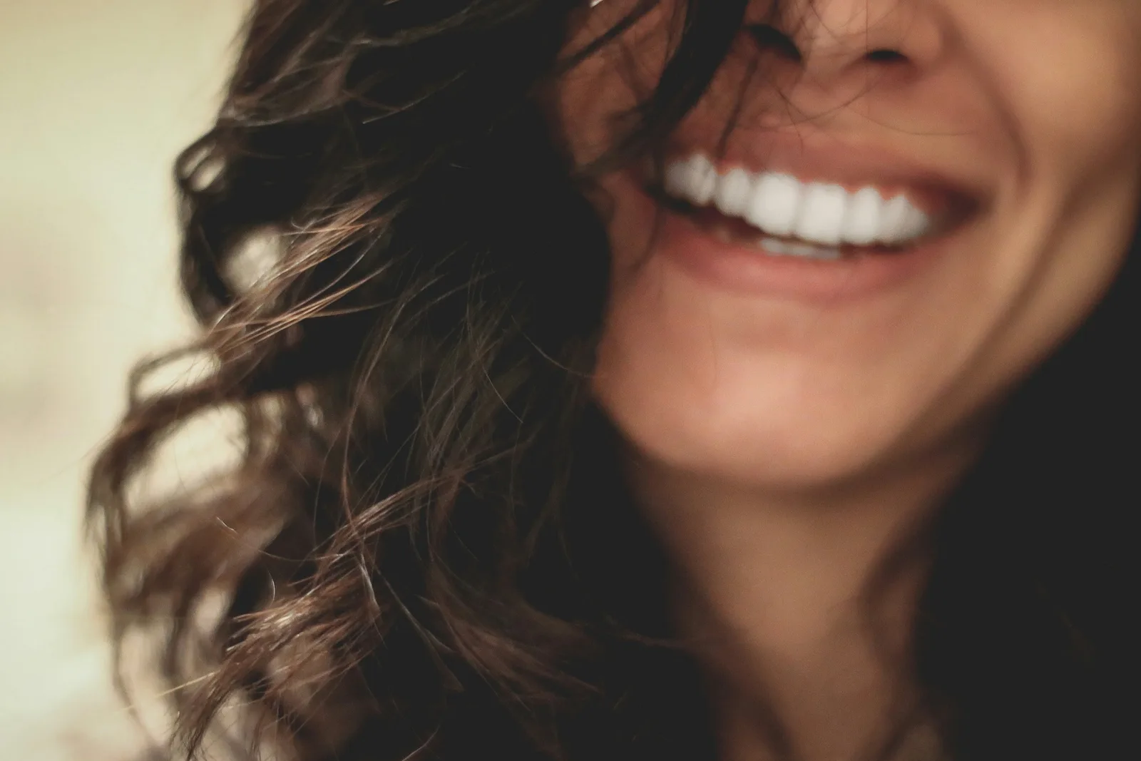 Patient smiling after dental implant treatment, alongside the What Are Dental Implants explanation in Victoria